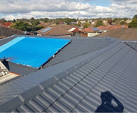 newly installed dark blue roof